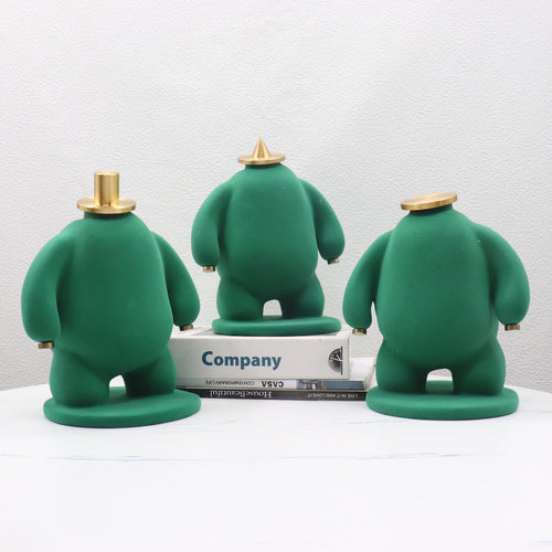 Abstract Faceless Fat Figure Statue with Gold Metal Hat