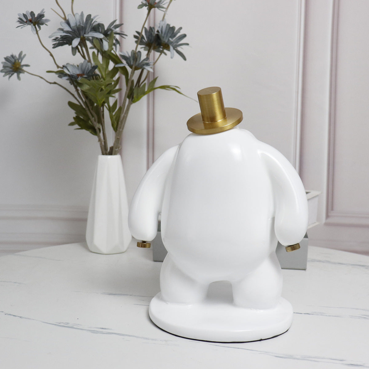 Abstract Faceless Fat Figure Statue with Gold Metal Hat