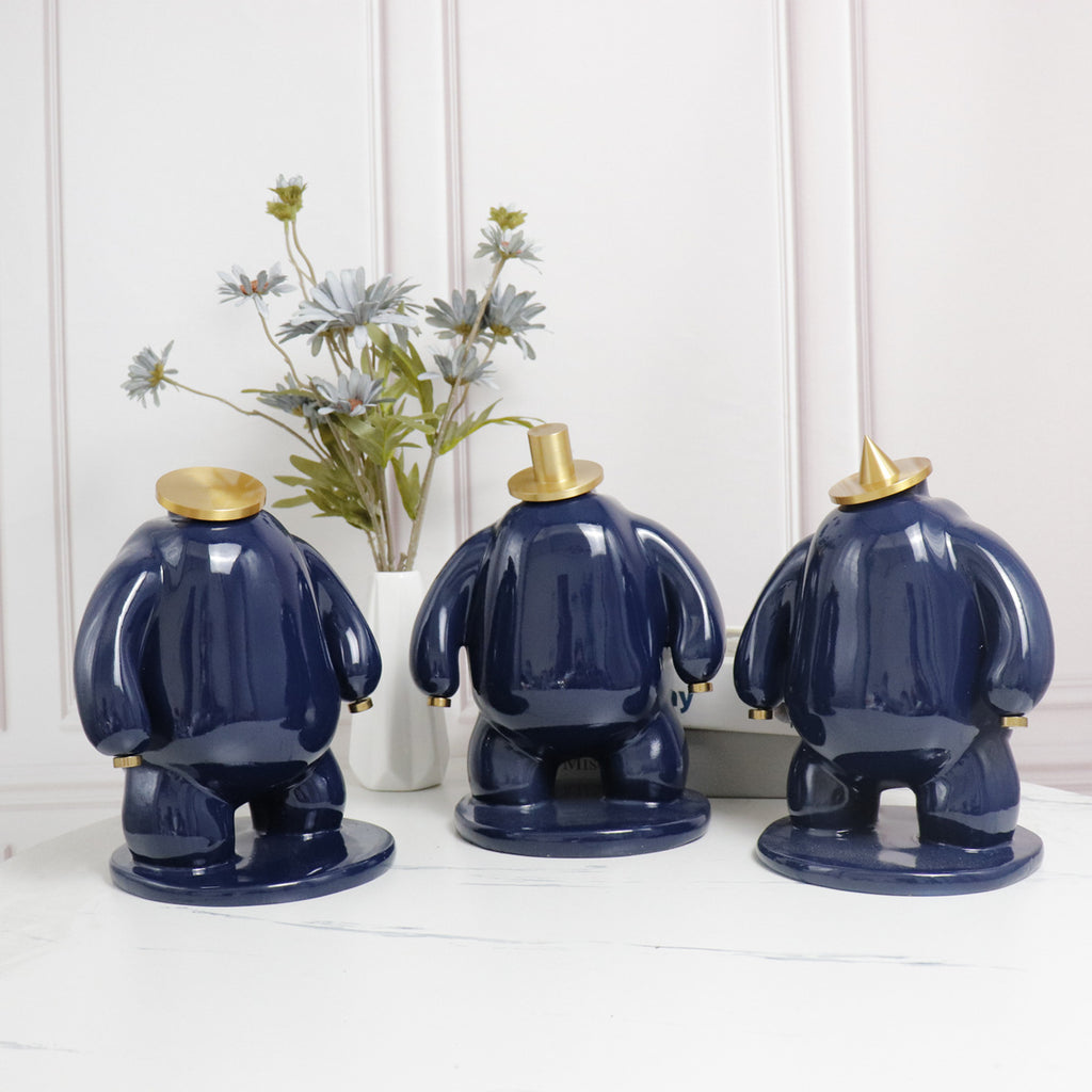 Abstract Faceless Fat Figure Statue with Gold Metal Hat